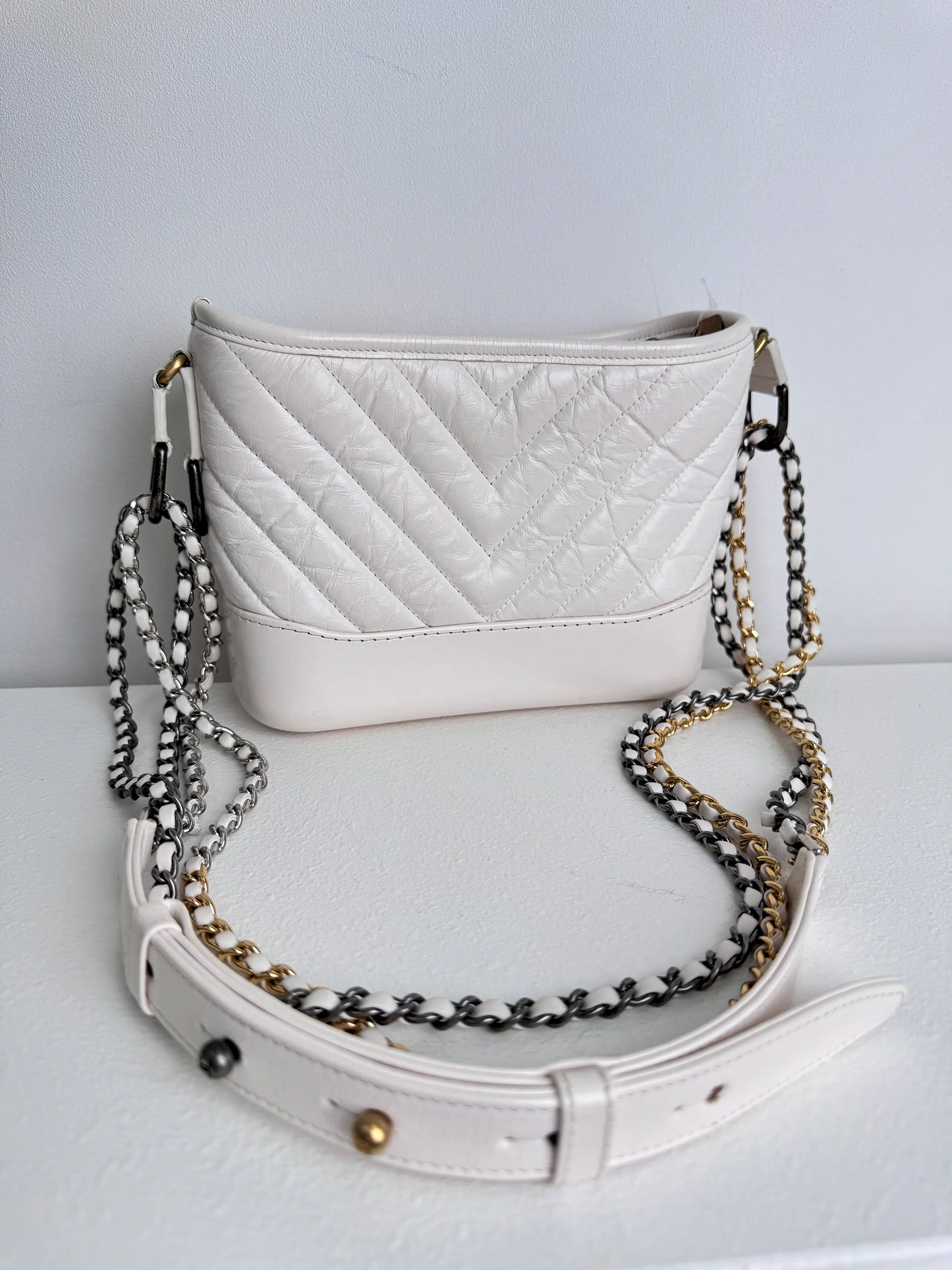 (A18) Chanel White Calfskin Chevron Small Gabrielle Gold/Silver/Ruthenium Hardware Series 29 Year 2020 Light Mark on Bottom