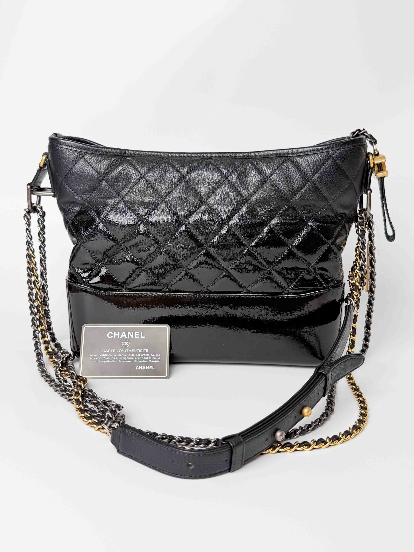 (A125) Chanel Black Patent Goatskin Medium Size Gabrielle Crossbody Bag, Ruthenium/Silver/Gold Hardware