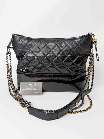 (A125) Chanel Black Patent Goatskin Medium Size Gabrielle Crossbody Bag, Ruthenium/Silver/Gold Hardware