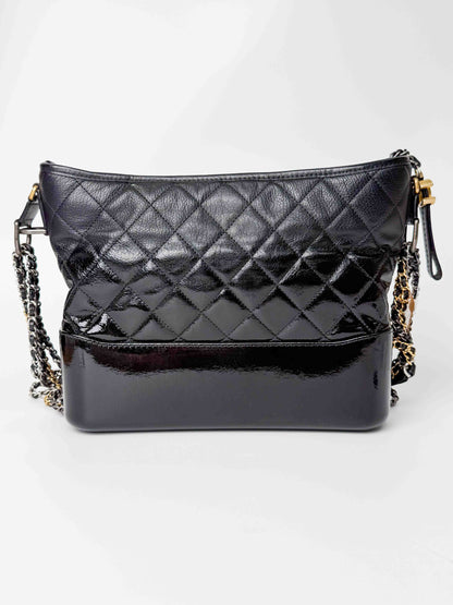 (A125) Chanel Black Patent Goatskin Medium Size Gabrielle Crossbody Bag, Ruthenium/Silver/Gold Hardware