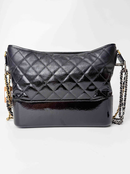 (A125) Chanel Black Patent Goatskin Medium Size Gabrielle Crossbody Bag, Ruthenium/Silver/Gold Hardware